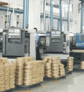 Friction disc production line with stacked components
